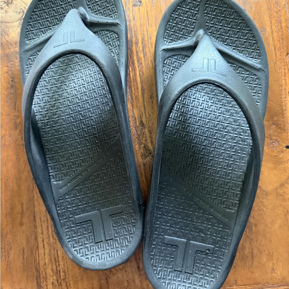 Stylish Black Flip Flops with Embossed Logo